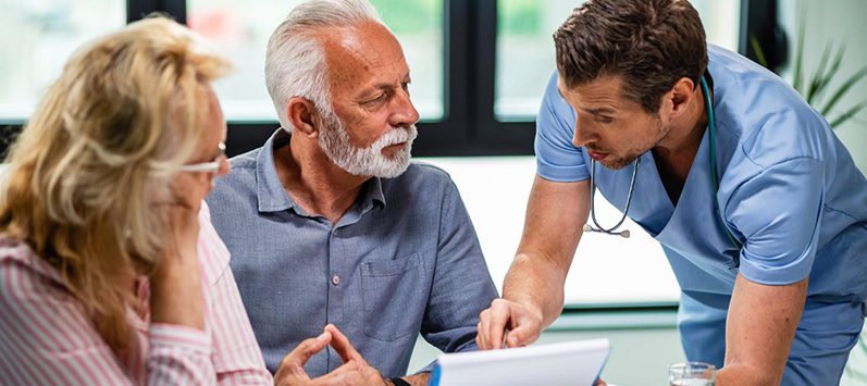 Doctor explaining medicare to patients