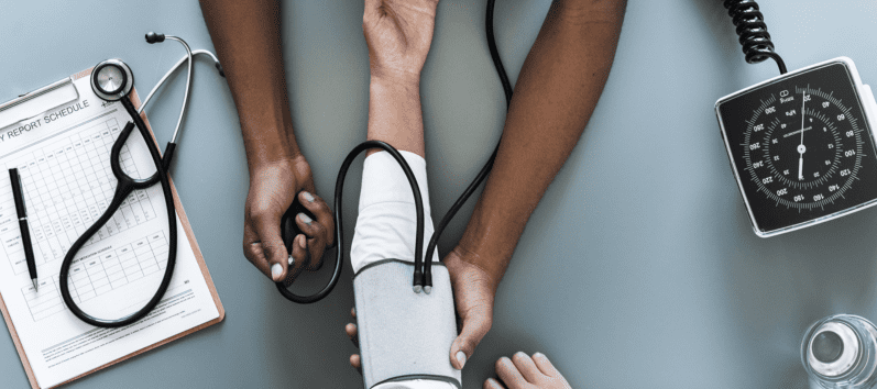 doctor taking blood pressure