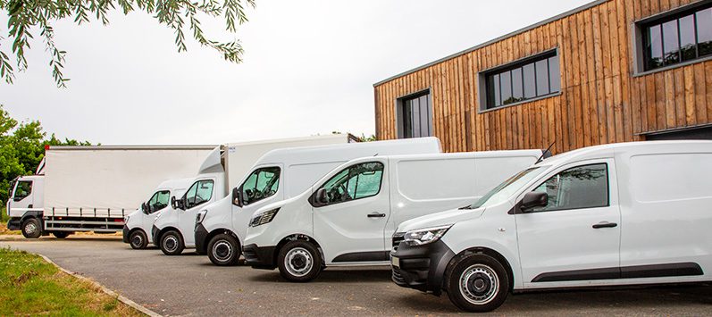 Fleet of white company vehicles