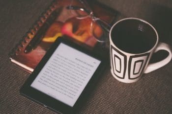 Reading glasses and ebook.