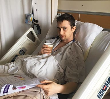 Luke in a Renown hospital bed