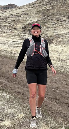 Michele Thomas running in the hills