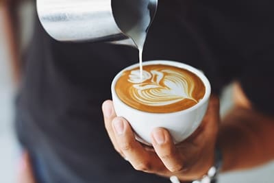 pouring a latte