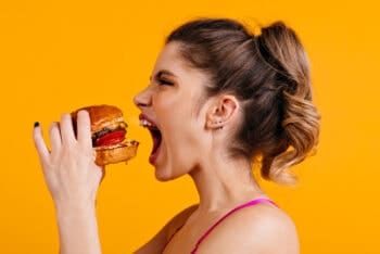 woman eating a burger